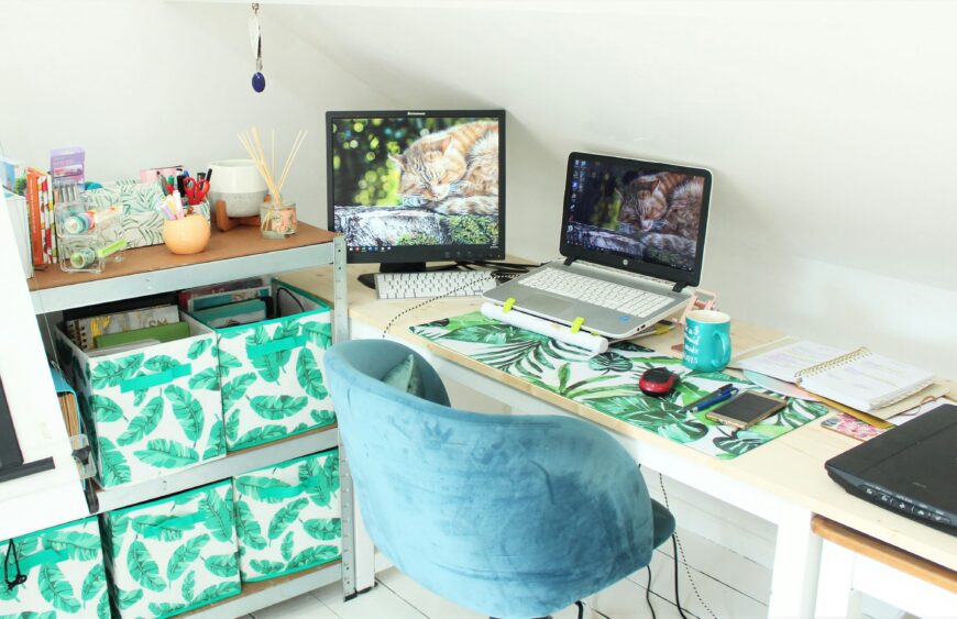 black laptop computer on white table